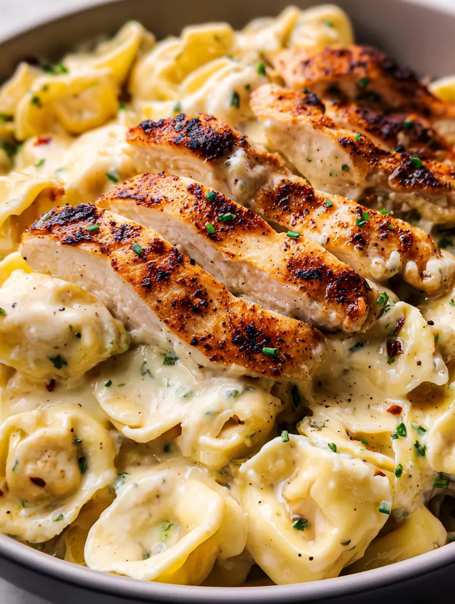 Plate with grilled chicken and pasta.