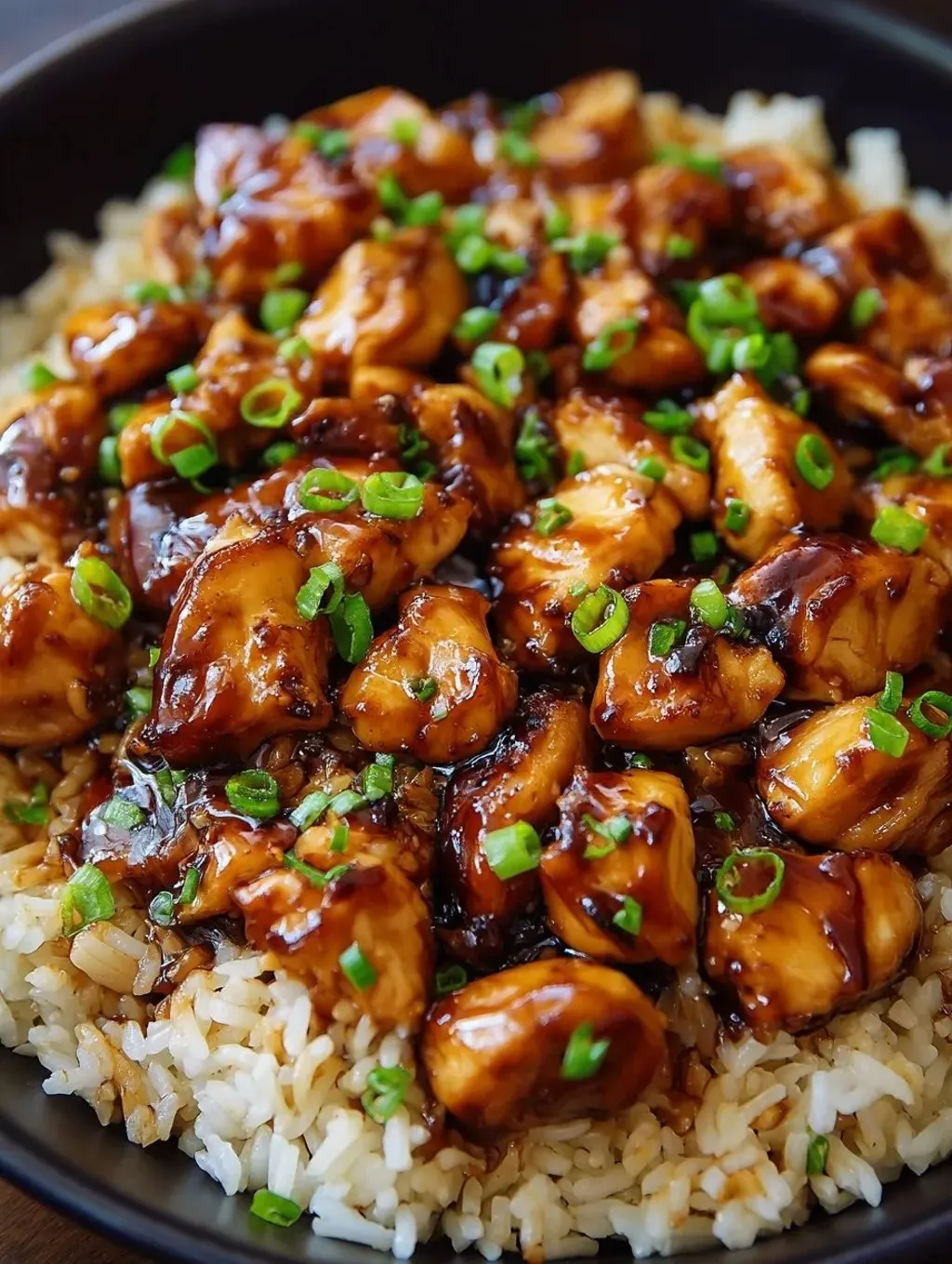 A dish filled with chicken and rice.