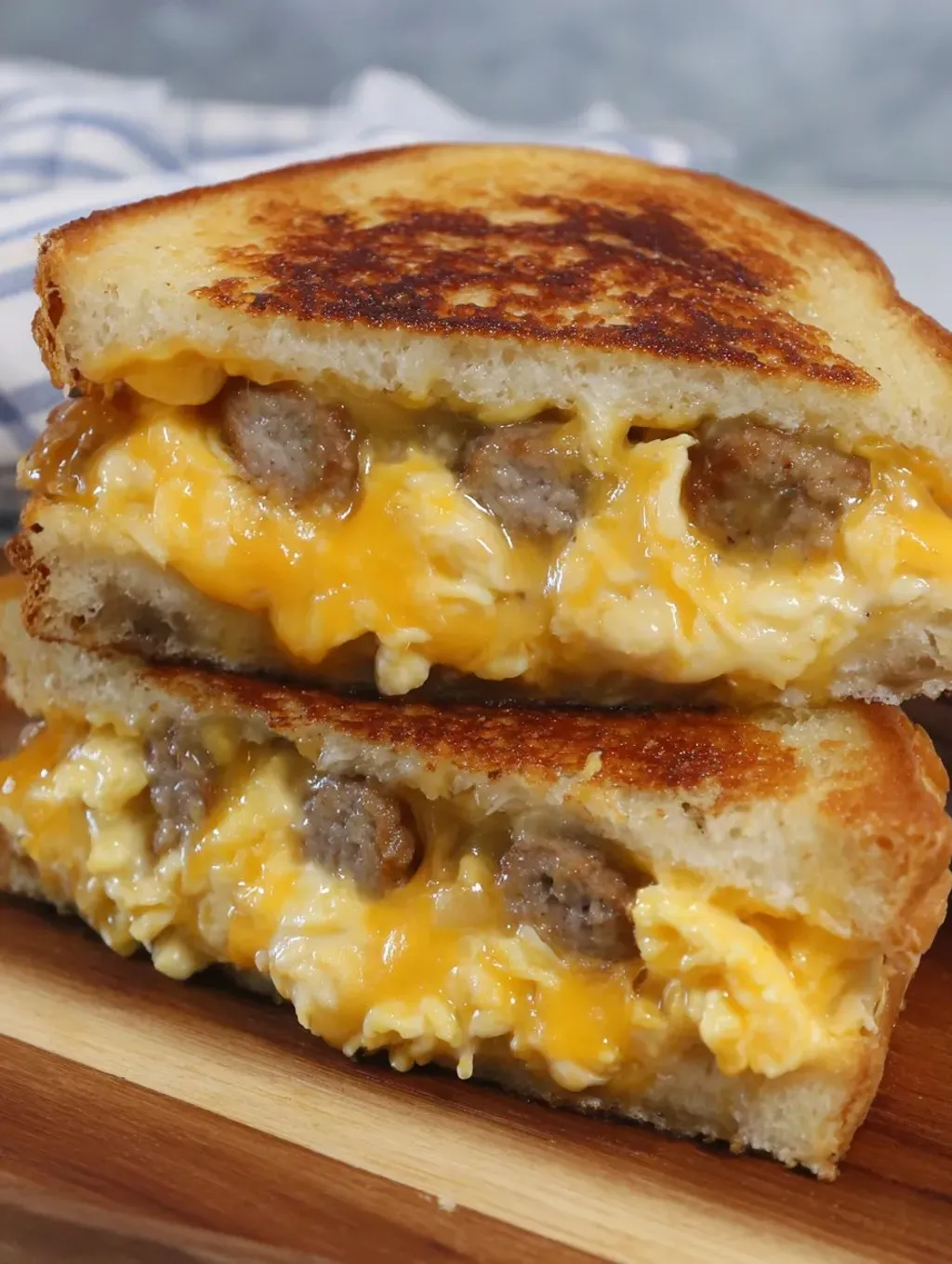 Sandwich loaded with sausage and gooey cheese.