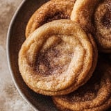 Bowl full of cinnamon sugar tossed donuts.