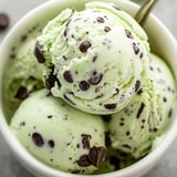 Chocolate chip-studded minty ice cream in a bowl.