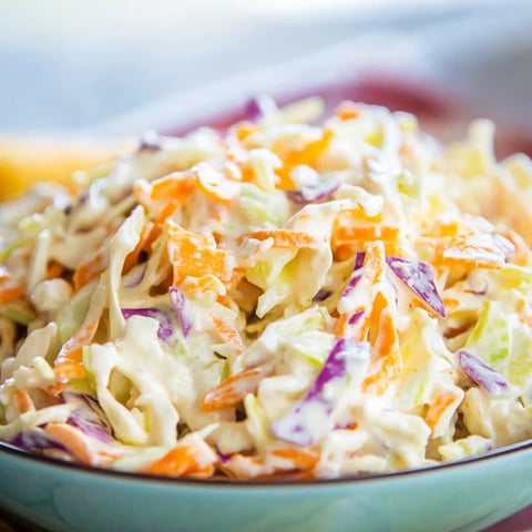 A bowl loaded with sweet, crunchy slaw.
